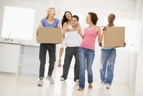 Professional house removals planning in Kennington with moving boxes and transport