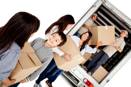 Office relocation planning in Kennington with moving team and packed boxes