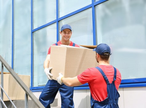 Staff training in safe lifting and handling during a removal job