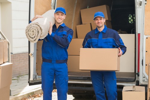 Removal team preparing a move in Kennington with boxes and furniture