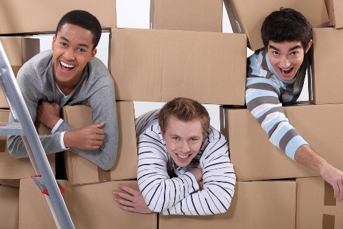 Packed office boxes and furniture prepared for removals in Kennington