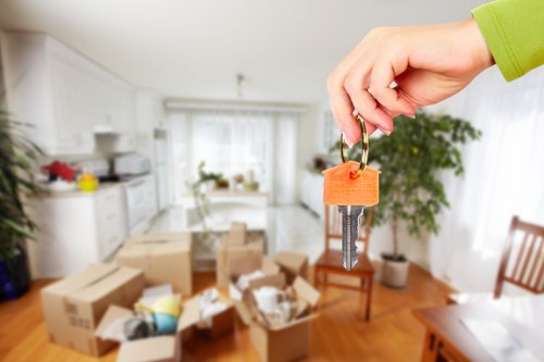 Professional movers organizing an office relocation schedule in Kennington
