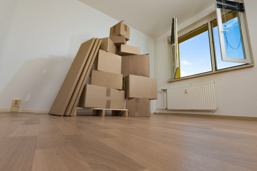 Packed stock and office items ready for transport in Kennington