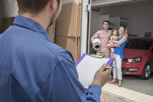 Kennington removals team managing furniture loading for a house move