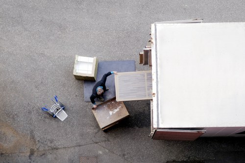 Crew handling furniture carefully during a professional removal