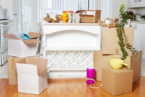Kennington moving company loading furniture carefully into a removal van