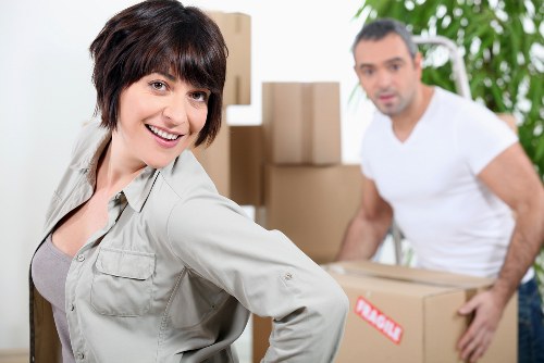 A removals team protecting household furniture during transit