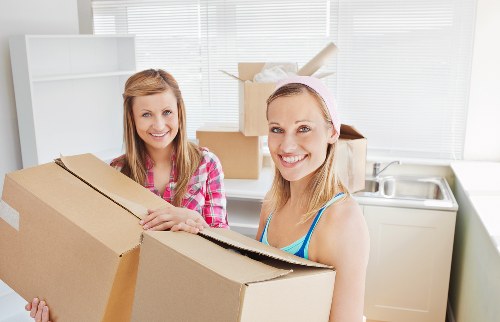 Loading boxes and furniture into a Kennington removal truck